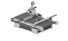 Zünd D3 L digital cutting system with a large, dark grey cutting surface and a monitor, on a white background. Zünd D3 L digital cutting system with a large, dark grey cutting surface and a monitor, on a white background.