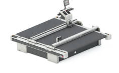 The Zünd D3 3XL digital cutting system features a large, automated conveyor belt and a precision cutting head for efficient material processing. The Zünd D3 3XL digital cutting system features a large, automated conveyor belt and a precision cutting head for efficient material processing.