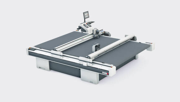 Zünd D3 Digital Cutter 2XL-3200, a high-precision automated cutting system, shown on a neutral background. Zünd D3 Digital Cutter 2XL-3200, a high-precision automated cutting system, shown on a neutral background.