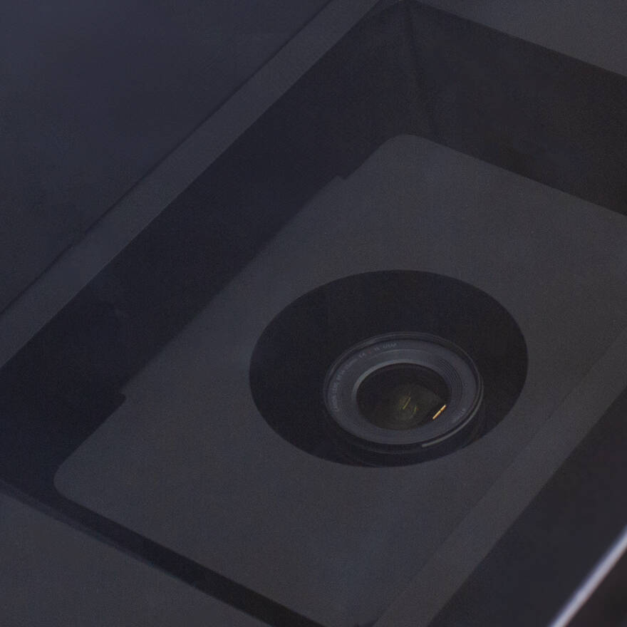 Close-up view of the undercam camera lens on a Zünd Systemtechnik cutting machine. Close-up view of the undercam camera lens on a Zünd Systemtechnik cutting machine.