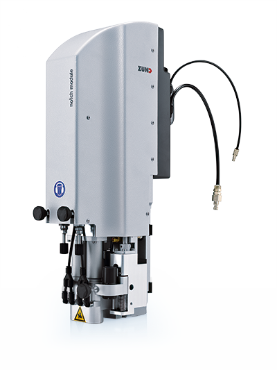 Zünd notch module with cables attached, designed for precision cutting applications. Features a silver casing and black accents. Zünd notch module with cables attached, designed for precision cutting applications. Features a silver casing and black accents.